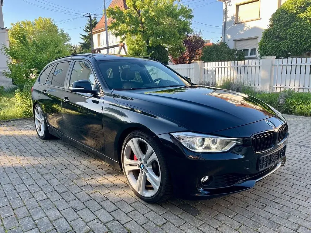Gebraucht BMW 330 Sport Line 258 PS (189 kW) 2013 Schwarz Kombi