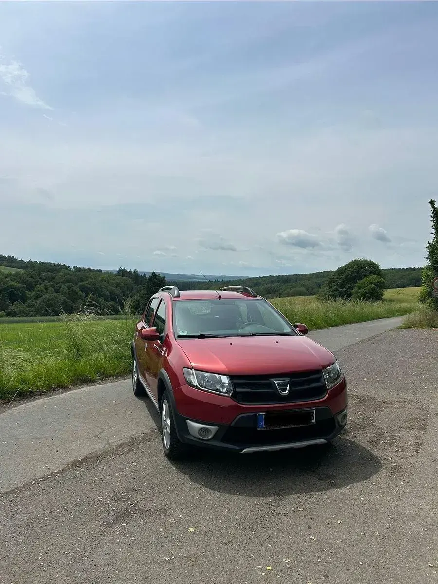 Gebraucht Dacia Sandero Stepway 90 PS (66 kW) 2013 Rot Limousine