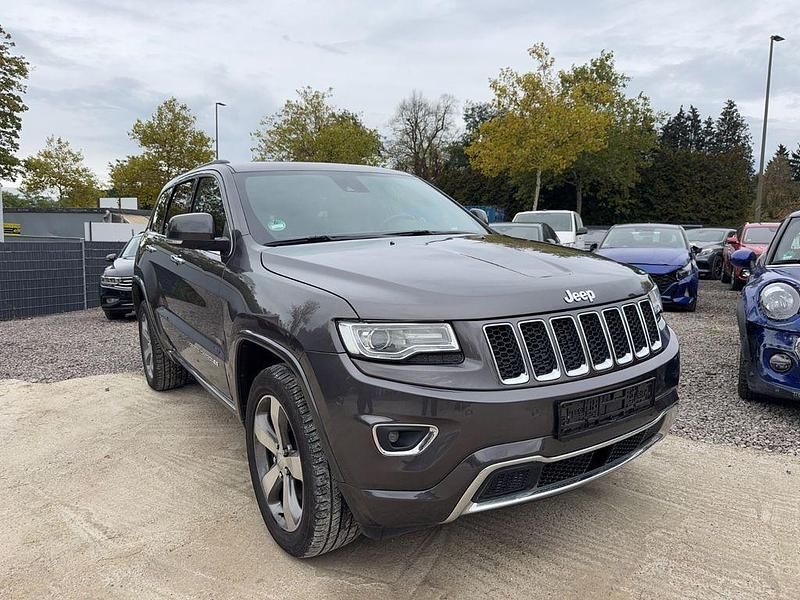 Grau Gebraucht 2015 Jeep Grand Cherokee Overland SUV | 18.800 € (Superpreis) - Bild 1/4