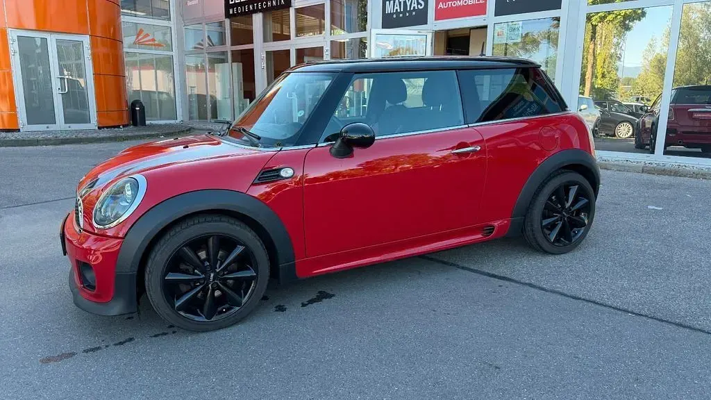 Gebraucht Mini John Cooper Works Chili 122 PS (89 kW) 2011 Chili (solar) red Kleinwagen