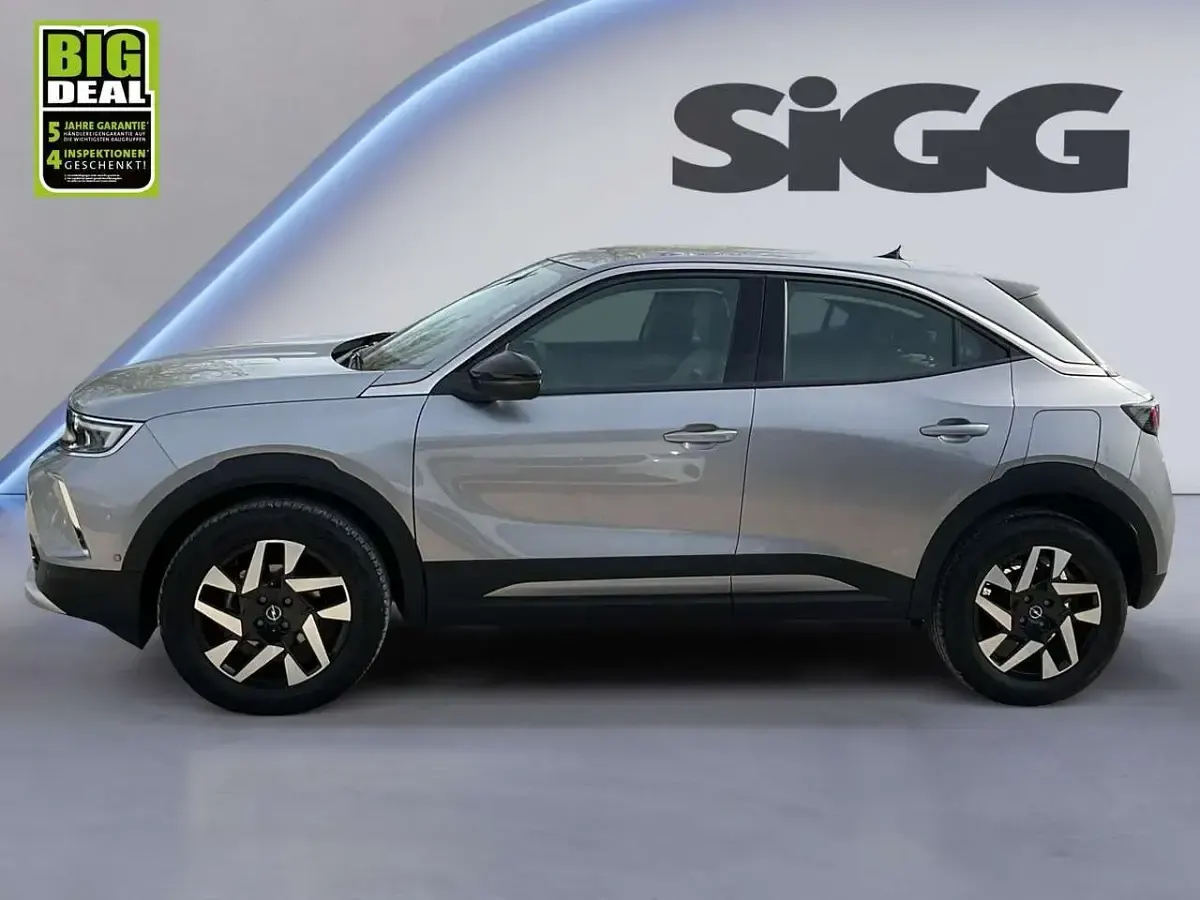 Gebraucht Opel Mokka Elegance 101 PS (74 kW) 2023 Kontrast grau / quarz silber SUV