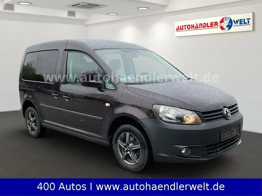 Używany VW Caddy 105 KM (77 kW) 2011 Purpurowy Minivan