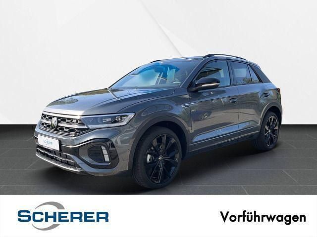 Indiumgrau metallic / schwarz (metallic) Gebraucht 2025 VW T-Roc R-line SUV | 38.380 € (Teuer) - Bild 1/4
