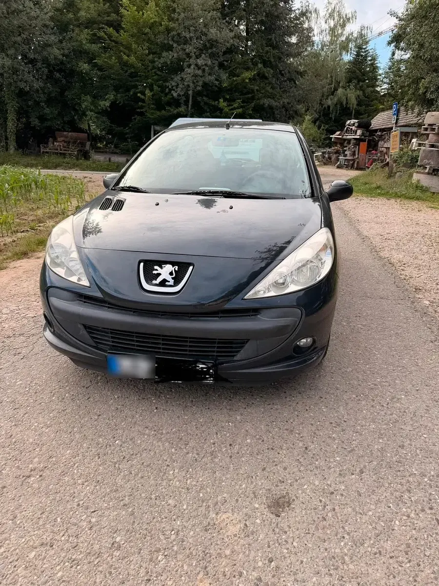 Gebraucht Peugeot 206+ 75 PS (55 kW) 2009 Schwarz Kleinwagen