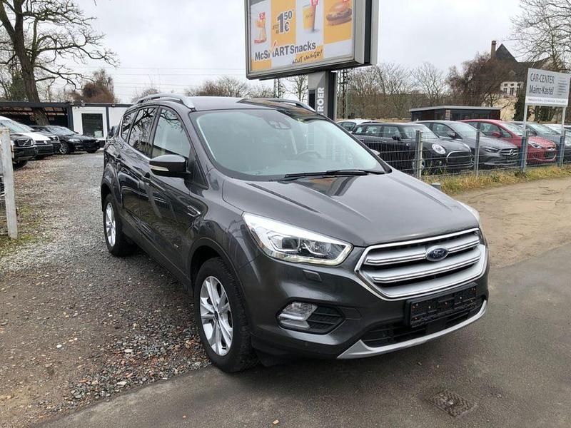 Grau Gebraucht 2017 Ford Kuga Titanium SUV | 14.890 € (Teuer) - Bild 1/4