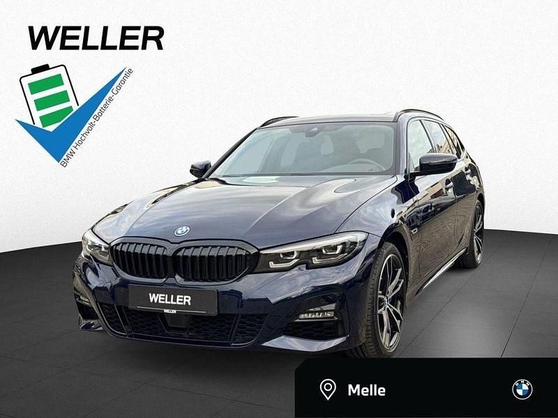 Tansanitblau ii (blau) Gebraucht 2022 BMW 330e Shadowline Kombi | 33.250 € (Fairer Preis) - Bild 1/4