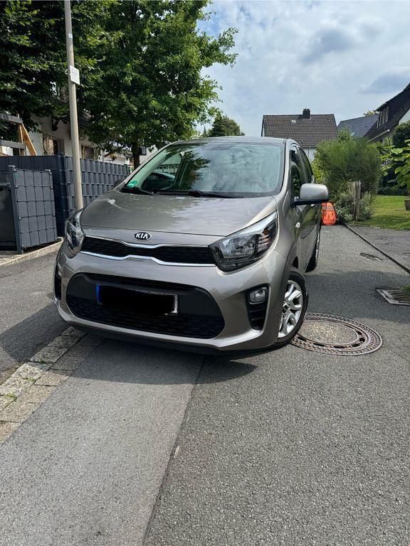 Grau Gebraucht 2018 Kia Picanto DREAM-TEAM Edition Kleinwagen | 8.450 € (Guter Preis) - Bild 1/4