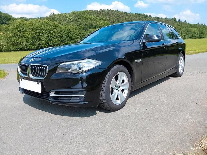 Schwarz Gebraucht 2014 BMW 518 Kombi | 11.900 € - Bild 1/4