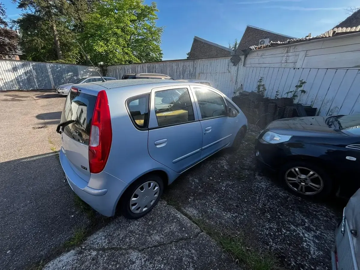 Second-hand Mitsubishi Colt 75 CP (55 kW) 2007 Albastru Hatchback