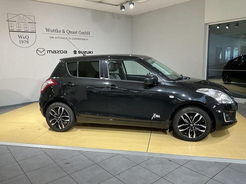 Gebraucht Suzuki Swift X-TRA 94 PS (69 kW) 2015 Schwarz Kleinwagen