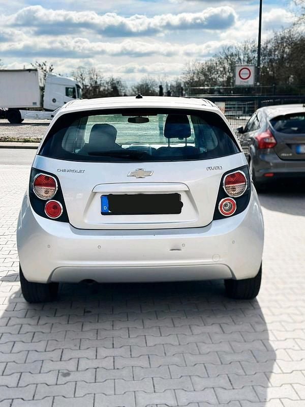 Second-hand Chevrolet Aveo 115 CP (84 kW) 2012 Argintiu Berlinǎ