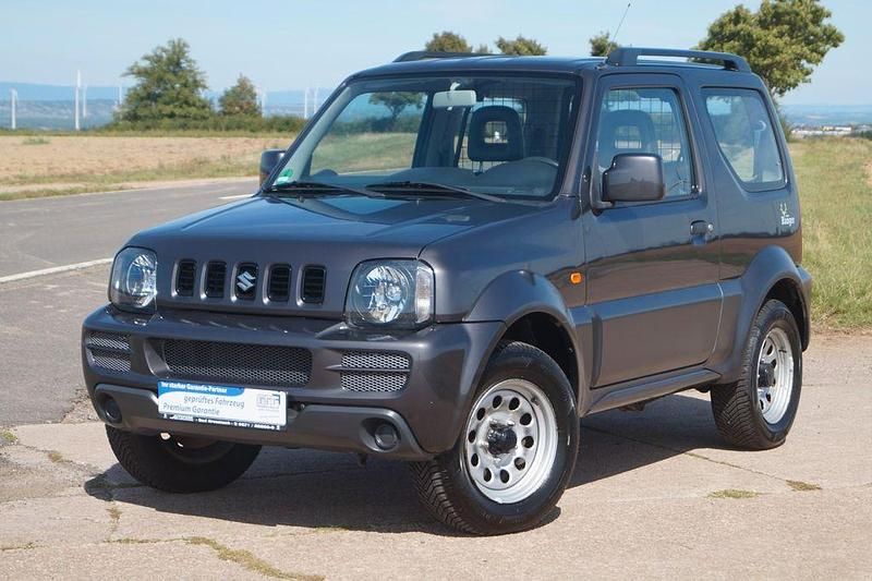 Grau Gebraucht 2010 Suzuki Jimny SUV | 10.990 € (Fairer Preis) - Bild 1/4