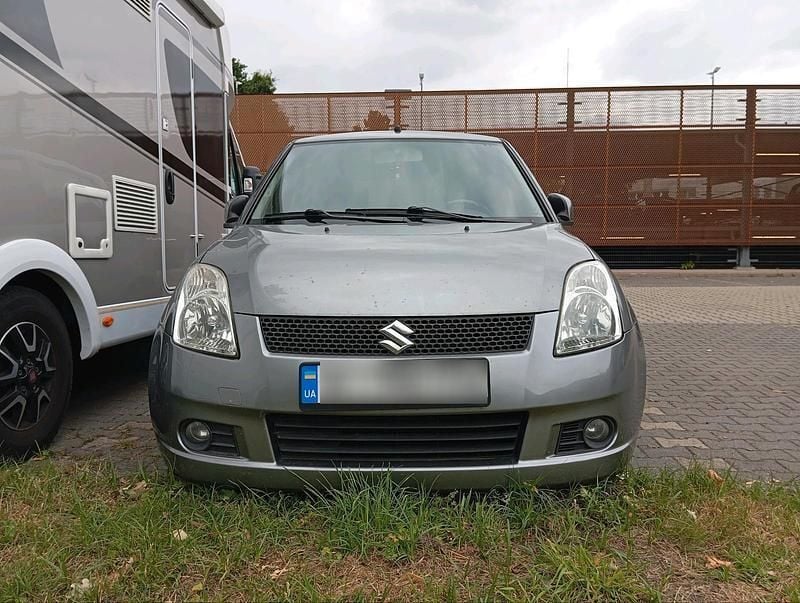 Grau Gebraucht 2007 Suzuki Swift Kleinwagen | 2.800 € (Fairer Preis) - Bild 1/4