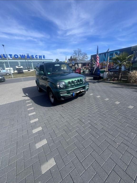 Gebraucht Suzuki Jimny 86 PS (63 kW) 2012 Grün SUV