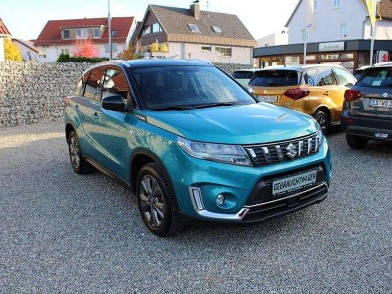 Gebraucht Suzuki Vitara Comfort 116 PS (85 kW) 2022 Atlantis turquoise/cosmic blac SUV