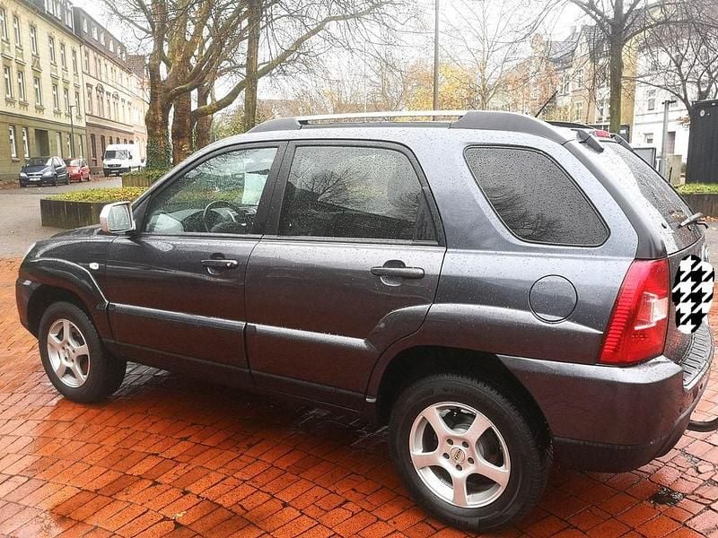 Blau Gebraucht 2010 Kia Sportage Attract SUV | 5.200 € (Fairer Preis) - Bild 1/4