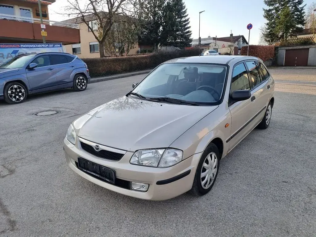 Gebraucht Mazda 323 88 PS (64 kW) 1998 Grau Limousine