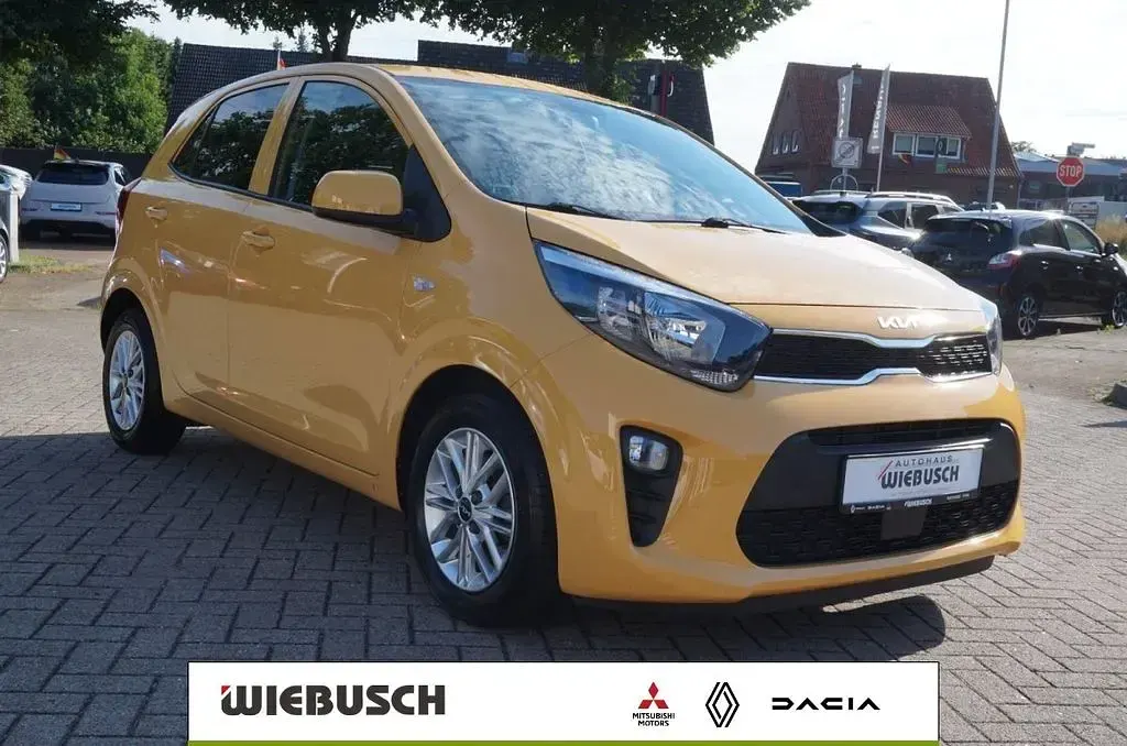 Gebraucht Kia Picanto Vision 67 PS (49 kW) 2023 (b2y) honey bee yellow met. (metallic) Kleinwagen