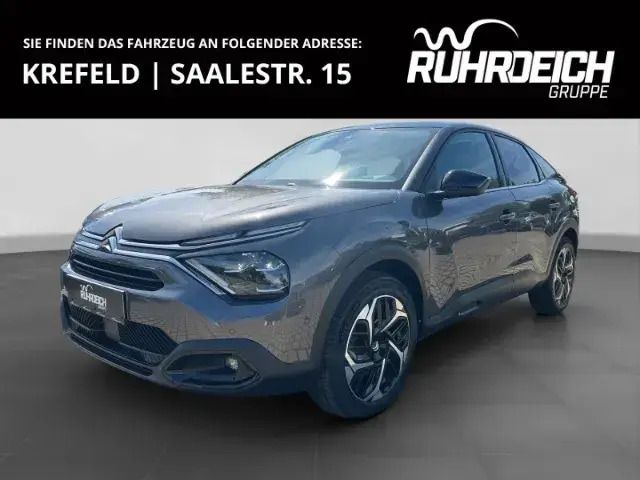 Grau Gebraucht 2023 Citroën C4 Shine Limousine | 24.489 € - Bild 1/4