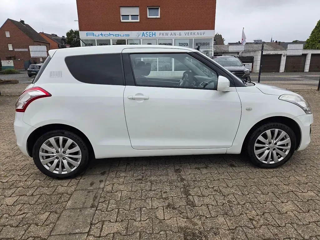 Gebraucht Suzuki Swift Club 94 PS (69 kW) 2015 Weiß Kleinwagen