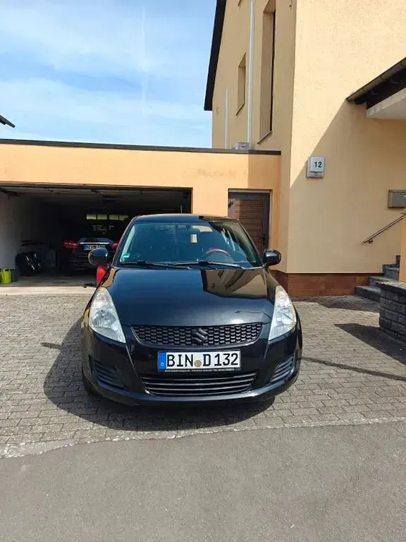 Gebraucht Suzuki Swift 94 PS (69 kW) 2011 Schwarz Kleinwagen