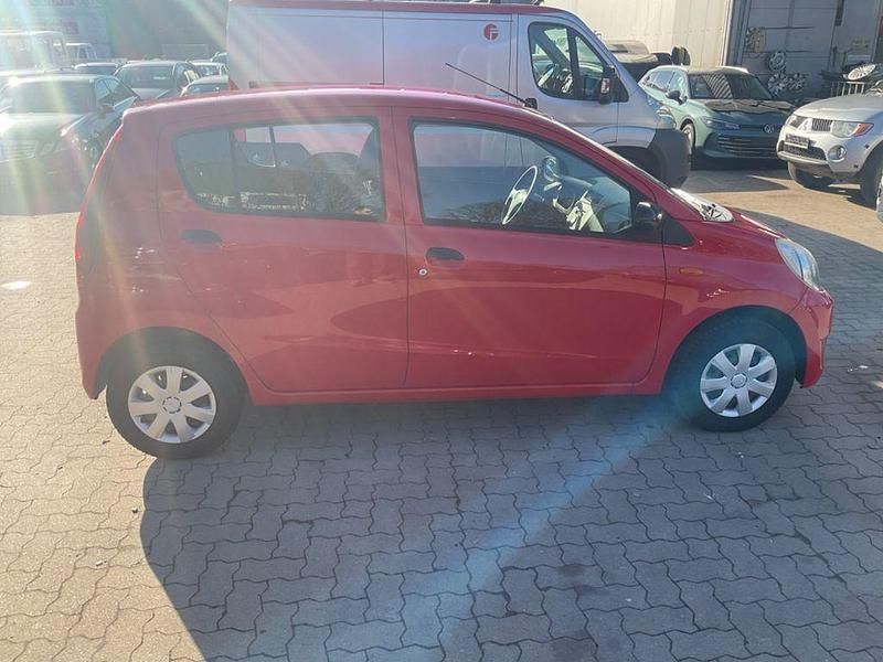 Gebraucht Daihatsu Cuore Plus 58 PS (42 kW) 2011 Rot Kleinwagen