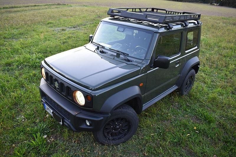 Grün Gebraucht 2019 Suzuki Jimny Comfort SUV | 27.500 € (Fairer Preis) - Bild 1/4