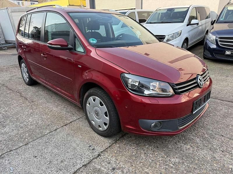 Gebraucht VW Touran Cup 105 PS (77 kW) 2014 Wild cherry red metallic Van / Kleinbus