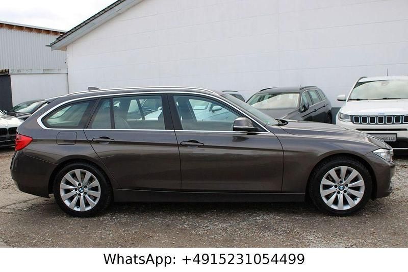 Gebraucht BMW 330 Comfort Edition 258 PS (189 kW) 2013 Braun Kombi