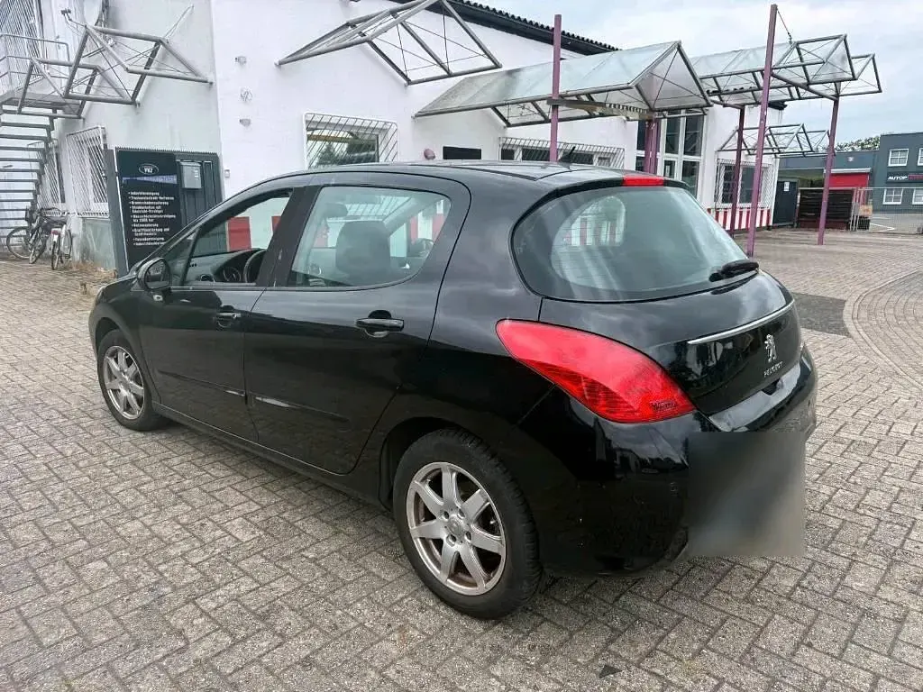 Gebraucht Peugeot 308 125 PS (91 kW) 2011 Schwarz Kleinwagen