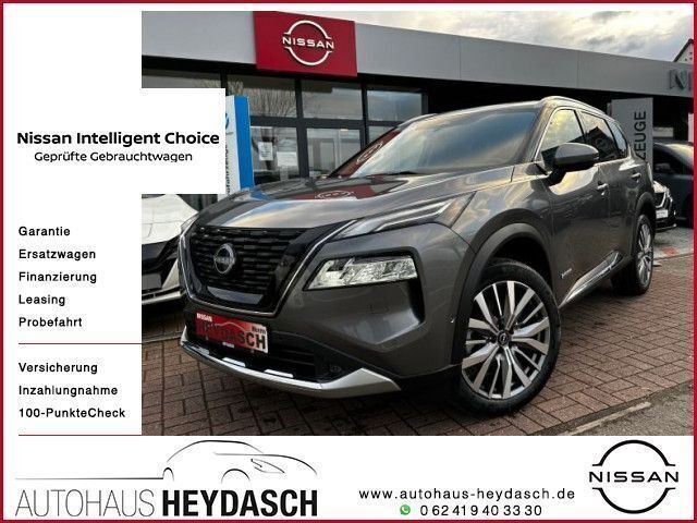 Gun metallic kad Neu 2024 Nissan X-Trail Tekna+ SUV | 47.339 € - Bild 1/4