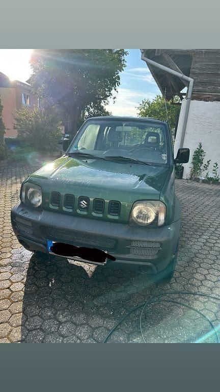 Grün Gebraucht 2009 Suzuki Jimny Club SUV | 10.500 € (Fairer Preis) - Bild 1/4