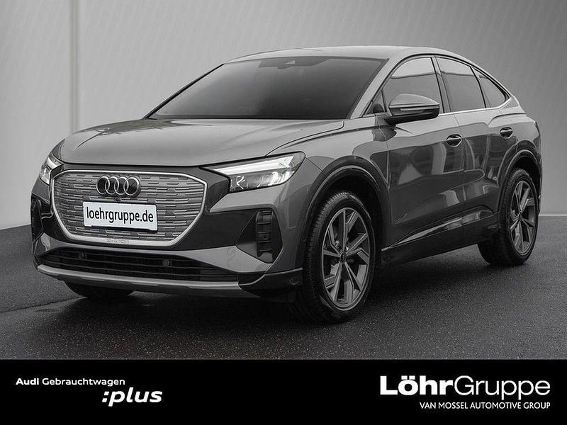 Taifungrau metallic Gebraucht 2022 Audi Q4 Sportback e-tron Advanced SUV | 26.580 € (Fairer Preis) - Bild 1/4