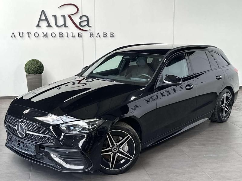 Schwarz Gebraucht 2022 Mercedes C300e AMG line Kombi | 33.989 € (Teuer) - Bild 1/4