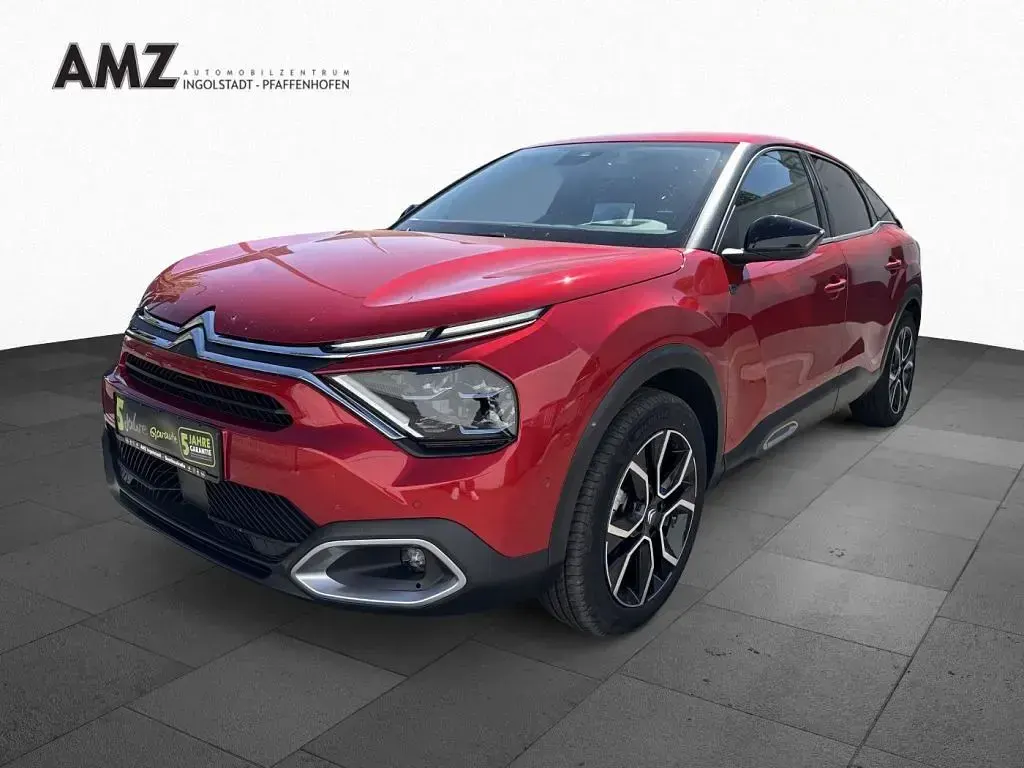 Używany Citroën e-C4 Shine 100 kW (136 KM) 2023 Czerwony Sedan/Limuzyna