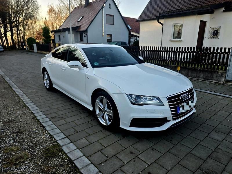 Braun Gebraucht 2013 Audi A7 Sportback Design Kleinwagen | 14.499 € (Fairer Preis) - Bild 1/4