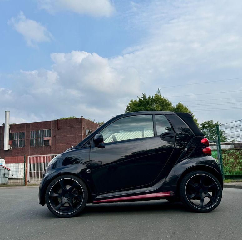 Schwarz Gebraucht 2011 Smart ForTwo Cabrio Brabus Cabrio | 6.490 € (Fairer Preis) - Bild 1/4