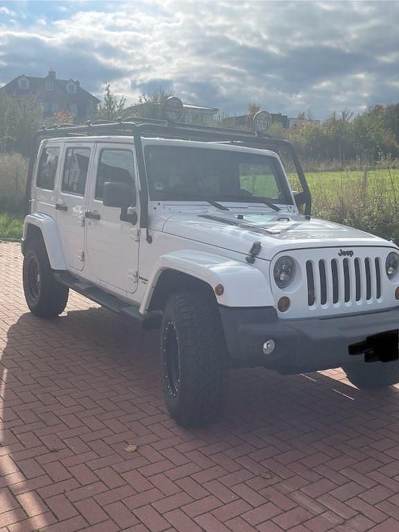 Weiß Gebraucht 2013 Jeep Wrangler Unlimited SUV | 24.750 € (Fairer Preis) - Bild 1/4