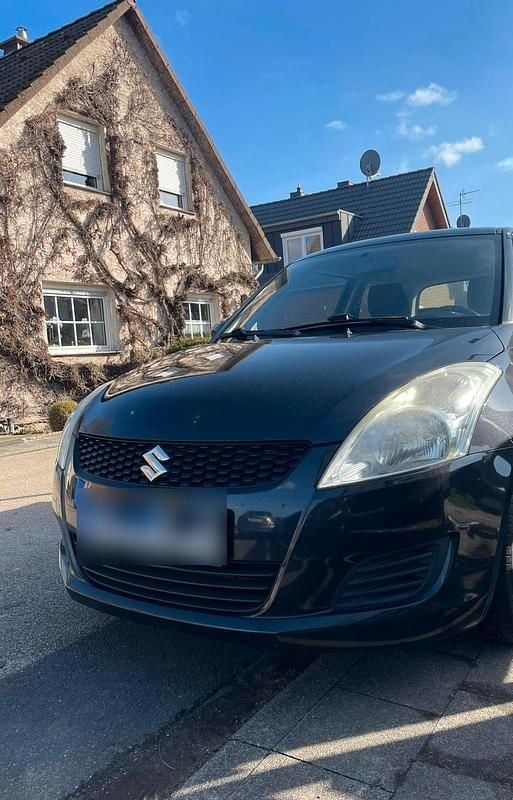 Gebraucht Suzuki Swift 94 PS (69 kW) 2013 Schwarz Kleinwagen