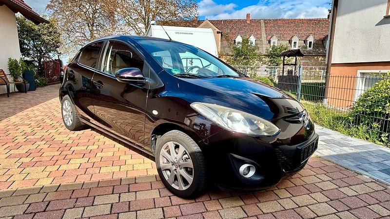 Andere farben Gebraucht 2011 Mazda 2 Kleinwagen | 6.990 € - Bild 1/4