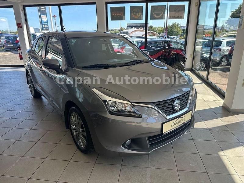 Grau Gebraucht 2017 Suzuki Baleno Comfort Limousine | 8.650 € (Fairer Preis) - Bild 1/4