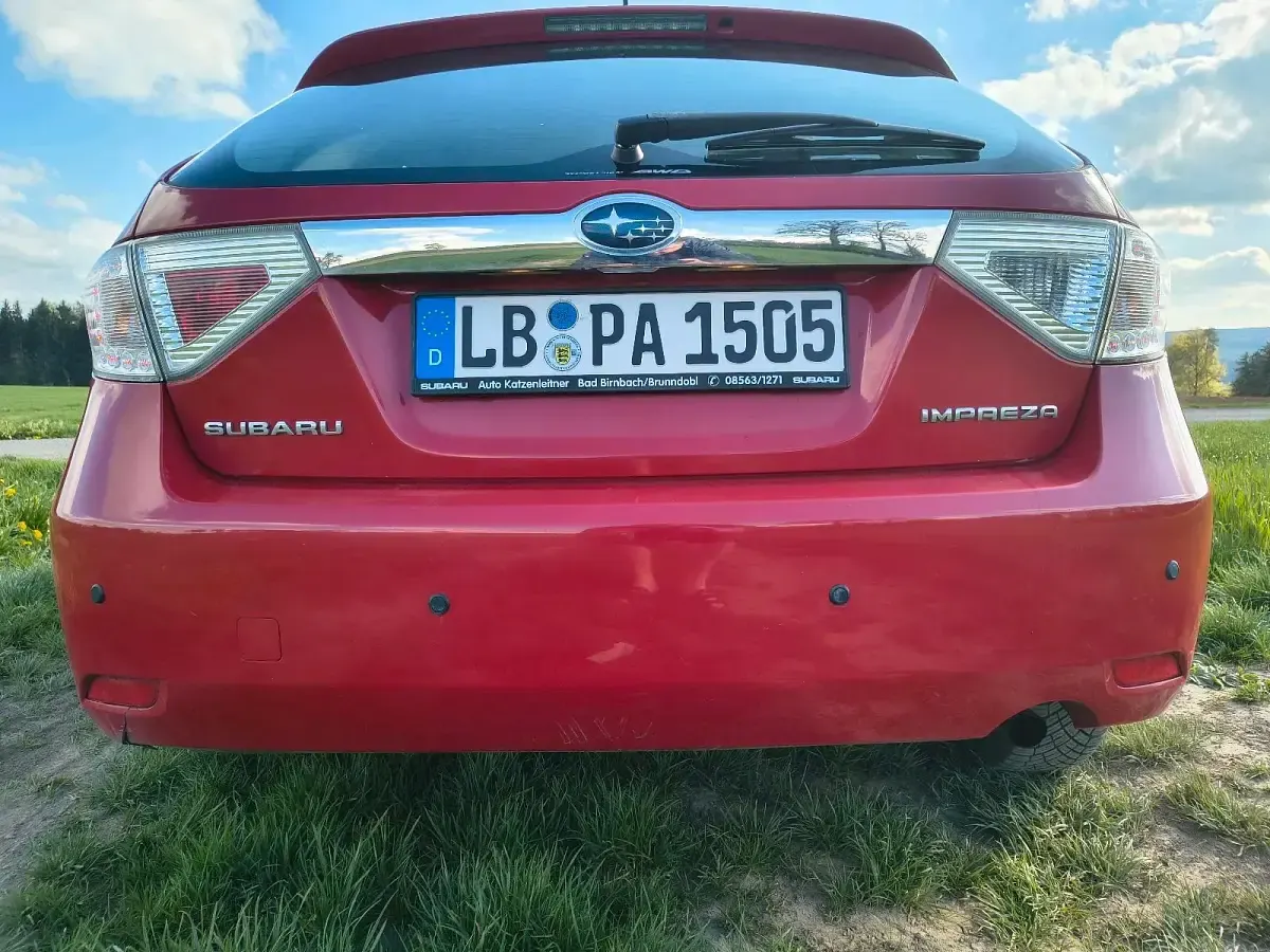 Gebraucht Subaru Impreza 107 PS (78 kW) 2009 Rot Kleinwagen