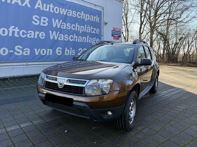 Braun Gebraucht 2010 Dacia Duster Lauréate SUV | 5.199 € (Fairer Preis) - Bild 1/4
