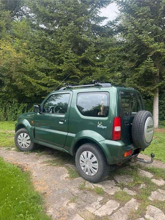 Grün Gebraucht 2010 Suzuki Jimny SUV | 8.000 € (Fairer Preis) - Bild 1/4