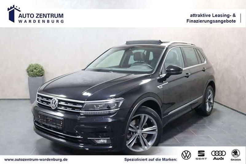 Schwarz perleffekt metallic (metallic) Gebraucht 2018 VW Tiguan Highline SUV | 26.950 € (Guter Preis) - Bild 1/4