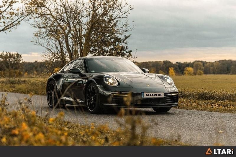 Tiefschwarz Gebraucht 2021 Porsche 911 Carrera S Sport Coupé | 113.999 € (Fairer Preis) - Bild 1/4