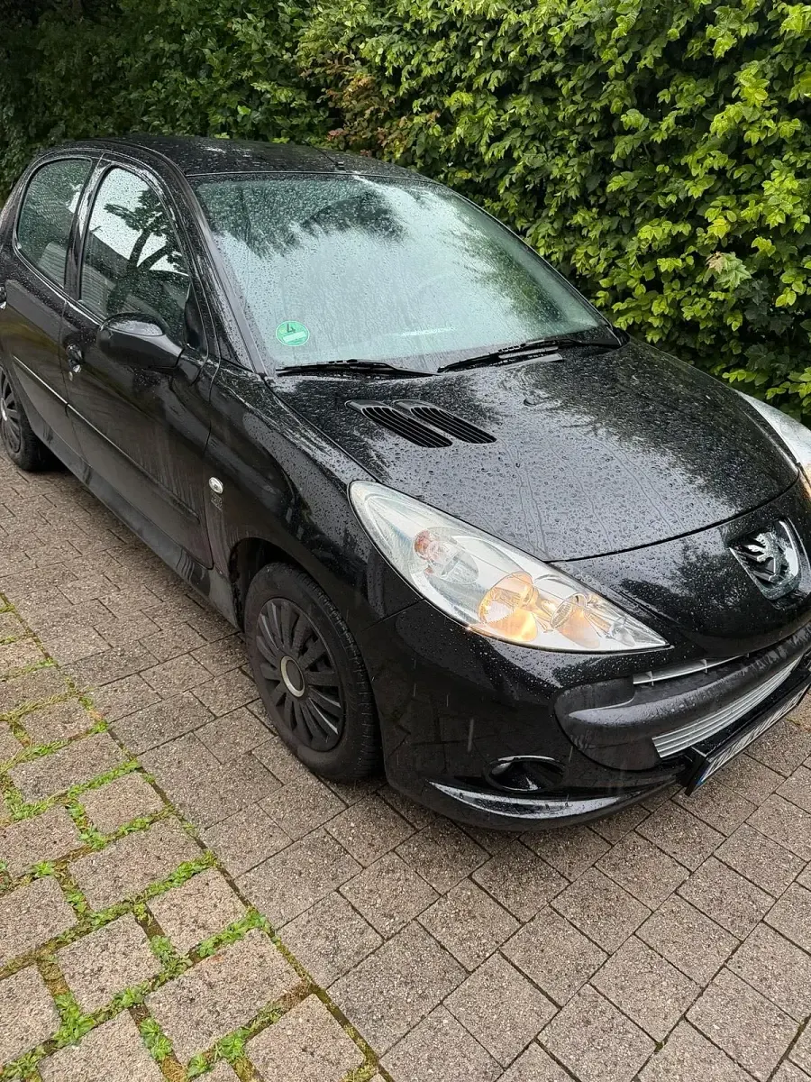 Gebraucht Peugeot 206 75 PS (55 kW) 2009 Schwarz Kleinwagen