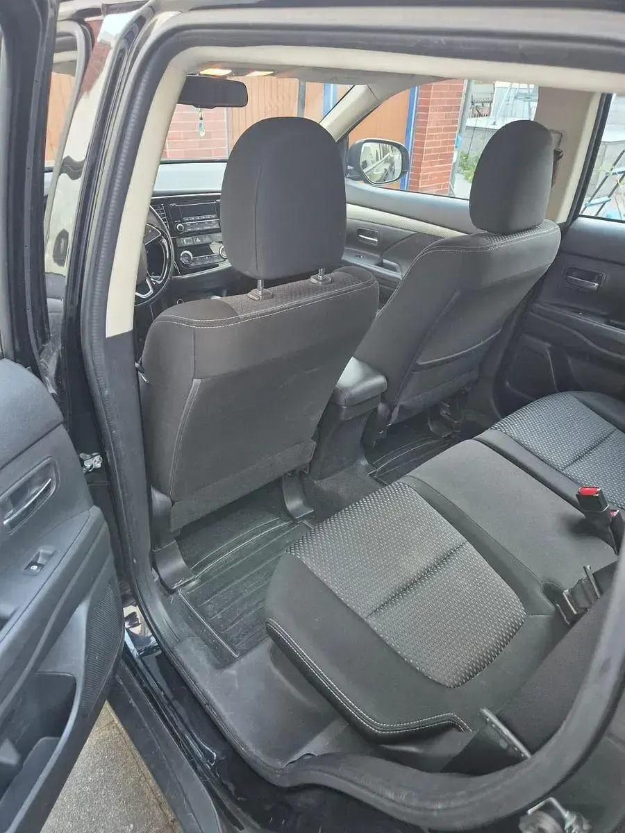 Używany Mitsubishi Outlander 150 KM (110 kW) 2018 Czarny SUV