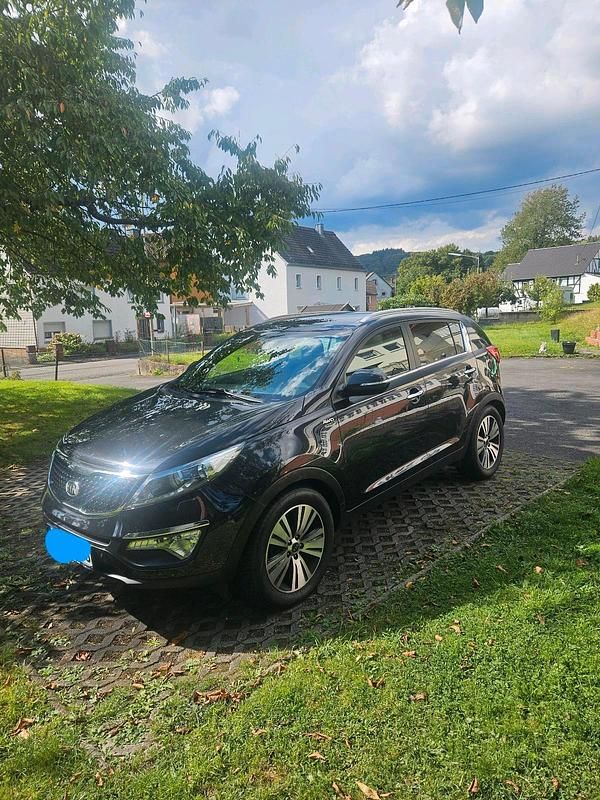 Schwarz Gebraucht 2014 Kia Sportage Platinum Edition SUV | 11.900 € (Fairer Preis) - Bild 1/4