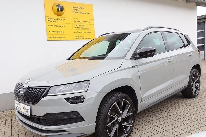 Grau Gebraucht 2019 Skoda Karoq SportLine SUV | 29.950 € (Fairer Preis) - Bild 1/4